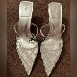 Zara: silver heel, never used tag is off